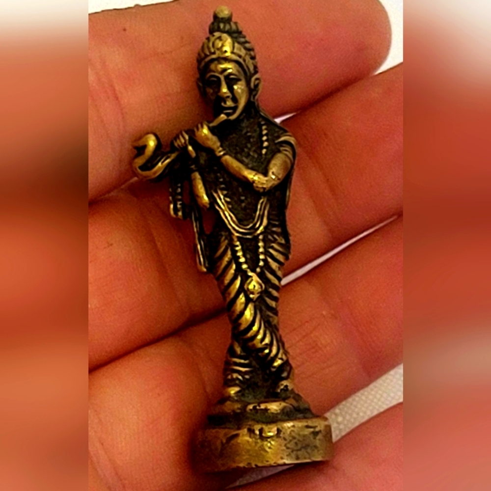Classic pocket-sized brass statue from Nepal of Shri Krishna playing his flute